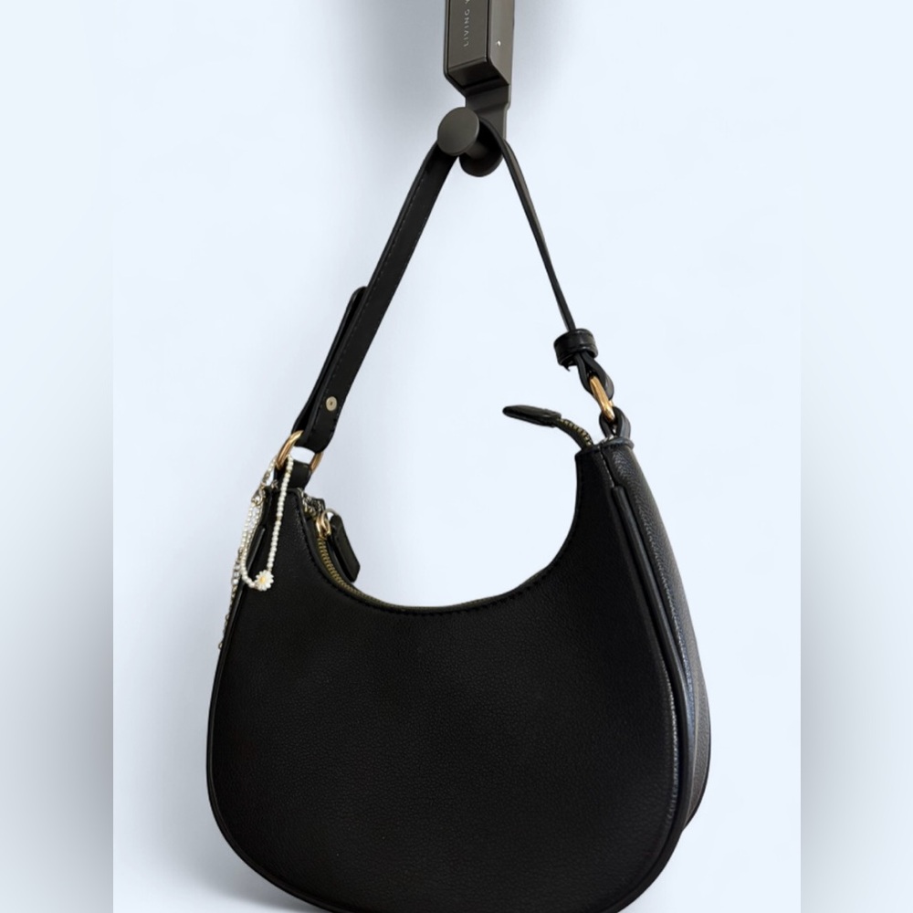 Elegant Black Women's Handbag with Daisy charm